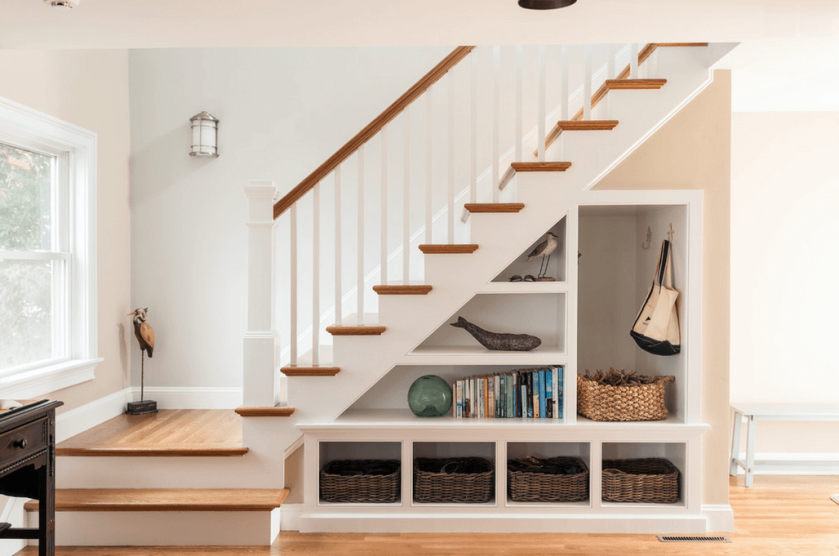 There are two ways to look at under-stair storage: You can use the stairs themselves as functional drawers, or use the nooks and awkward spaces created by a staircase to customize your storage. The first option can be expensive, but it offers a huge amount of storage potential.